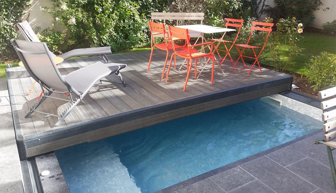 terrasse qui glisse par dessus la piscine